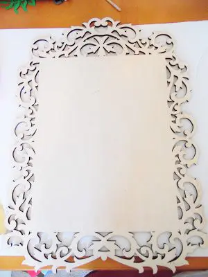 DIY home decor crafts, like this paper flower wall art, can start with this blank wood decorative frame. 