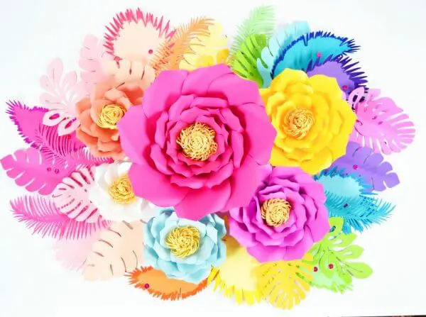 A brightly colored paper flowers and leaves centerpiece. 
