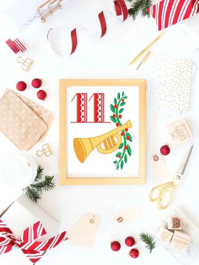 Flat lay photo of a mockup print of the 11th day of Christmas decorative printable