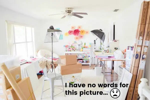A full room picture of my craft area shows no craft storage, just craft supply chaos. Craft room organization and craft storage are vital to a creative space.