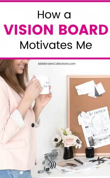 A woman smiles, holding a mug of coffee while looking at her desk and vision board. The text reads, "How a vision board motivates me."
