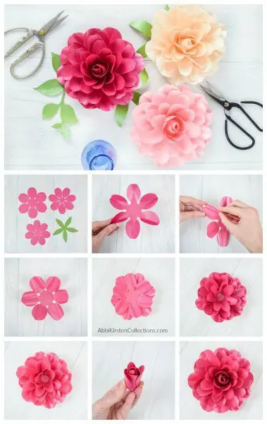 A step-by-step picture tutorial of how to assemble a dark pink small paper Camellia rose from the first cut-out to then final product. Three finished flowers in pink hues are shown above, along with scissors and a clear blue vase. The roses have bright green leaves.