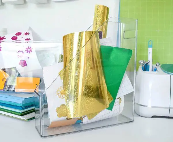 Keep vinyl scraps organized in a clear magazine holder. 