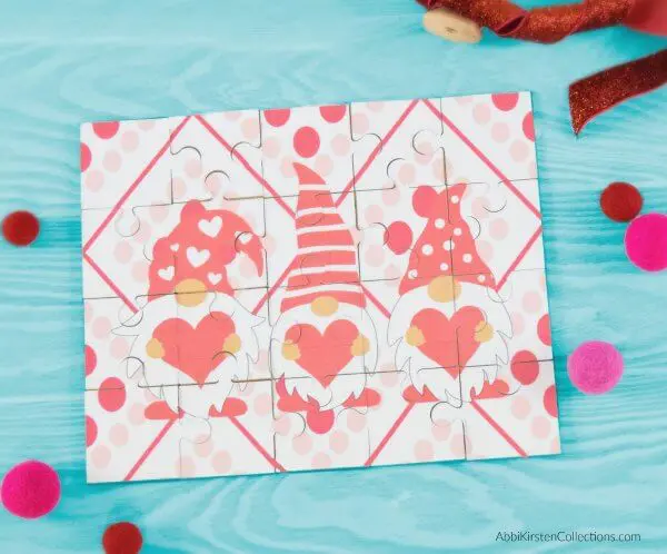 How to make easy chipboard and kraft board puzzles with your Cricut Explore and Maker machines. Download two free puzzle templates.