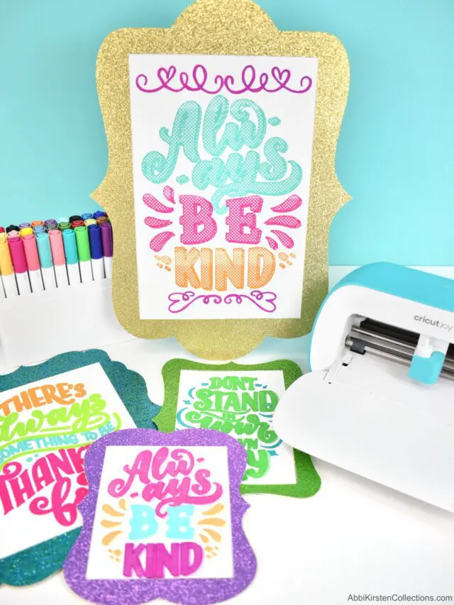 Printed posters with inspirational messages, colored using a pen and Cricut