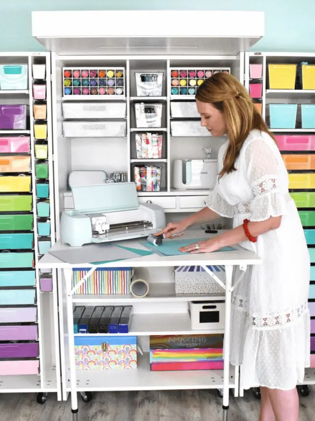 Abbi Kirsten wearing a white dress creating a craft on her Dreambox