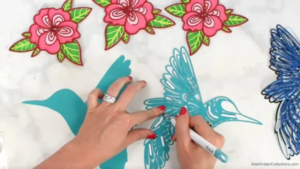 Layering paper crafts with 3D foam tape. 