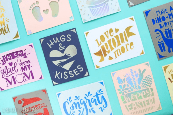 a bundle of small cutout cards in various colors and texts