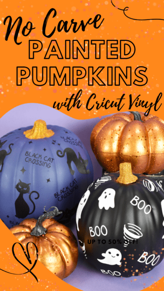 Three decorated craft pumpkins covered in Halloween vinyl cutouts made using Cricut. 