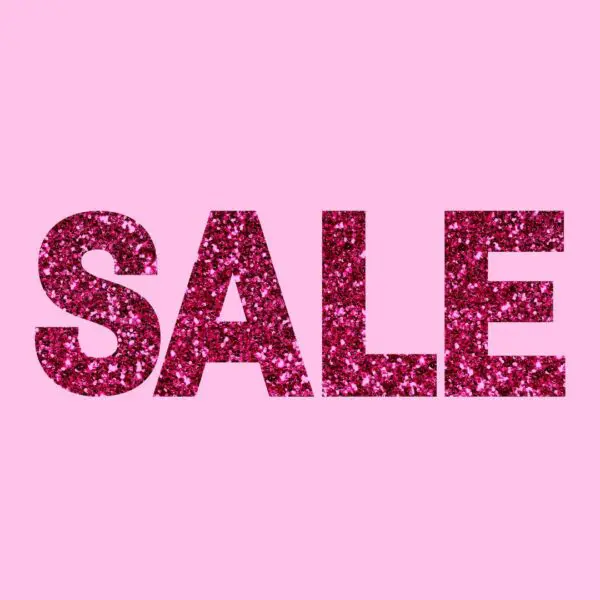The center of the pink picture has text in capital letters that says, "SALE." The text is in read glitter to attract attention.