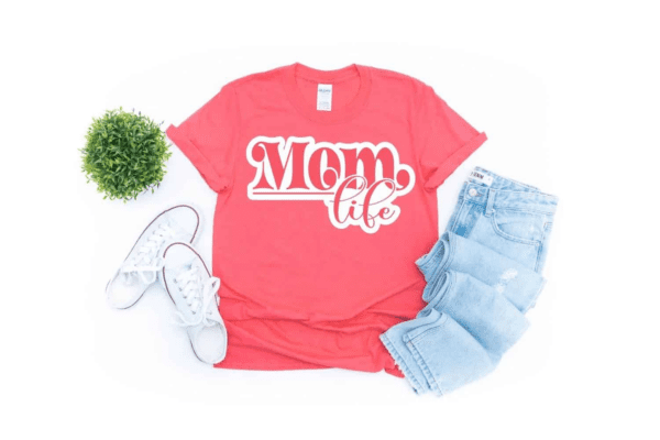 The image shows a free SVG file on a tshirt that reads Mom Life.