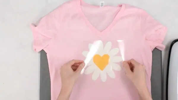 UV color changing iron on shown on a pink tshirt