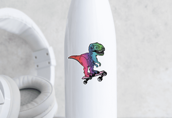 White water bottle with a DIY sticker on the front featuring a rainbow colored t-rex on a skateboard. 
