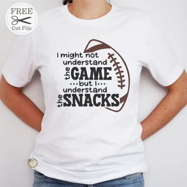 White t-shirt with football and text I might not understand the game but I understand the snacks.
