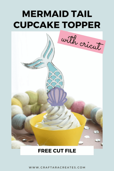 Aqua and white mermaid tail cupcake topper with violet and pink seashell.