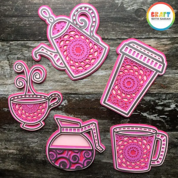 Get this free SVG of a pink layered mandala designed with gray outlines for teapot, coffee pot, coffee cup and teacup.