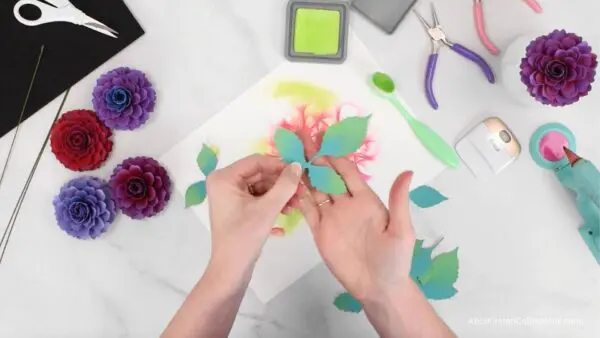 adding distress ink to leaves