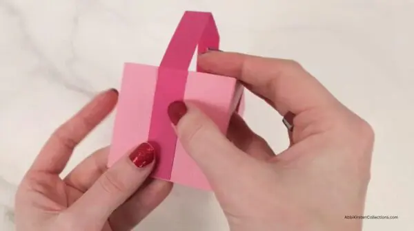 adding the ribbon around the box