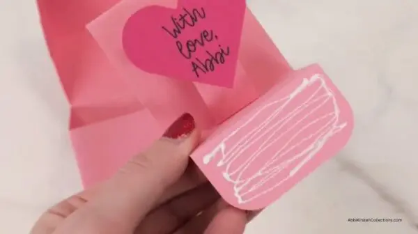 glue on front of surprise part of paper box