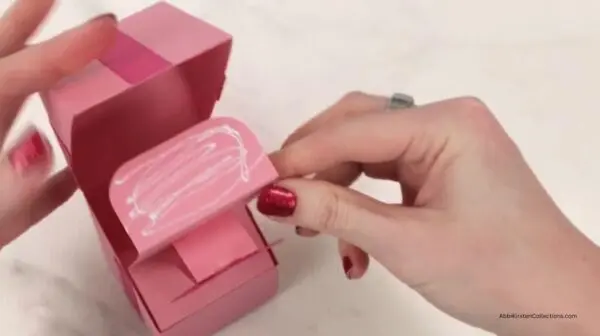 glue on inside bottom of paper  box