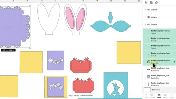 Attaching base of gift box to score lines