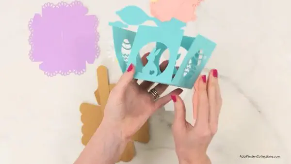 Folding all score lines for the treat basket