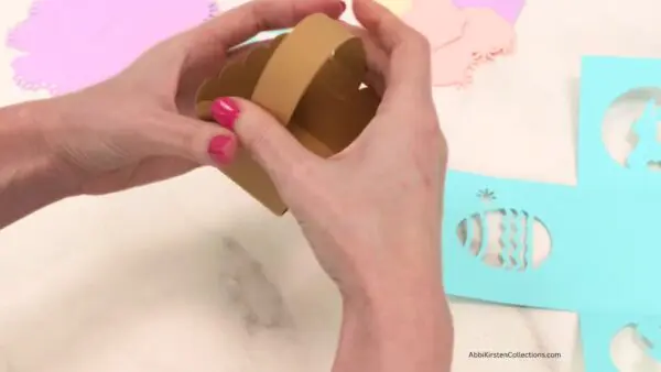 Gluing basket handle to basket