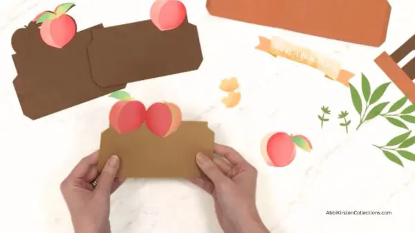 assembling the layers of the fruit pop-up card