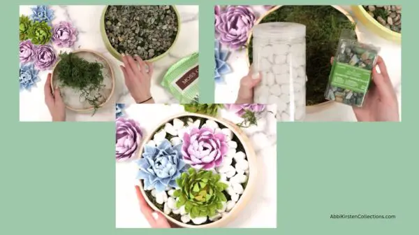 arrangement of succulent flowers in a bowl with rocks and moss