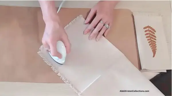 pressing the stenciled fabric