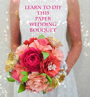 A close-up of a bride holding a full bouquet of realistic paper flowers in front of her at waist level. The text reads, "Learn to DIY this paper wedding bouquet." 