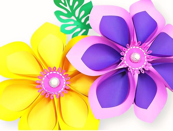 DIY Hawaiian paper flowers. How to make tropical paper flowers for summer party decorations. Download the flower template printables or SVG cut files for your Cricut. 