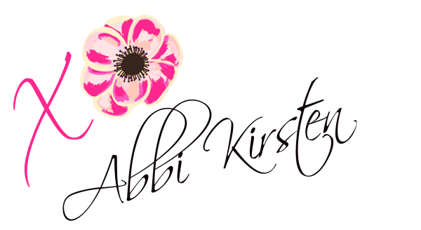 Abbi Kirsten signature with hot pink XO and flower. 