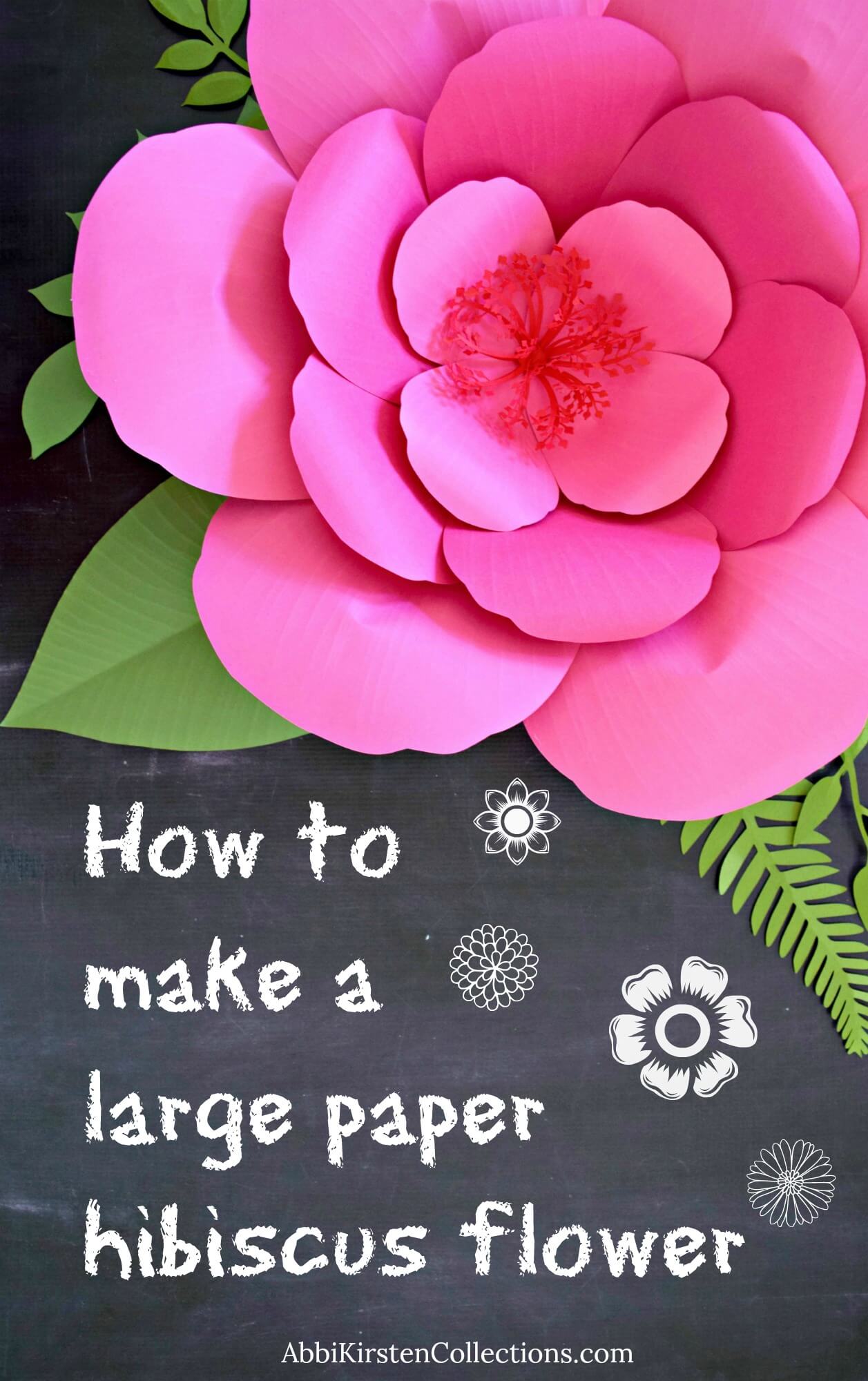 An image shows a close overhead view of a pink paper hibiscus flower and leaves. The chalkboard's black background has white chalk-like text that reads, “How To Make A Large Paper Hibiscus Flower.” 