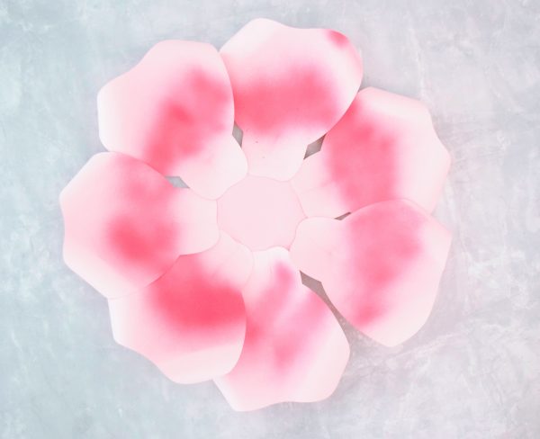 Seven ombre pink giant rose petals have been glued to the base of the Alora garden rose base. 