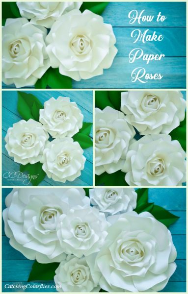 White paper roses with green leaves on a blue wooden surface. Image text overlay reads “How To Make Paper Roses” in the upper corner. 