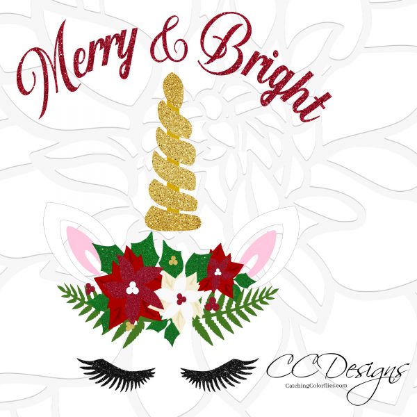 The unicorn with a poinsettia crown and golden horn is on a textured white background. The words "Merry and Bright" are in an arch above the unicorn face. 