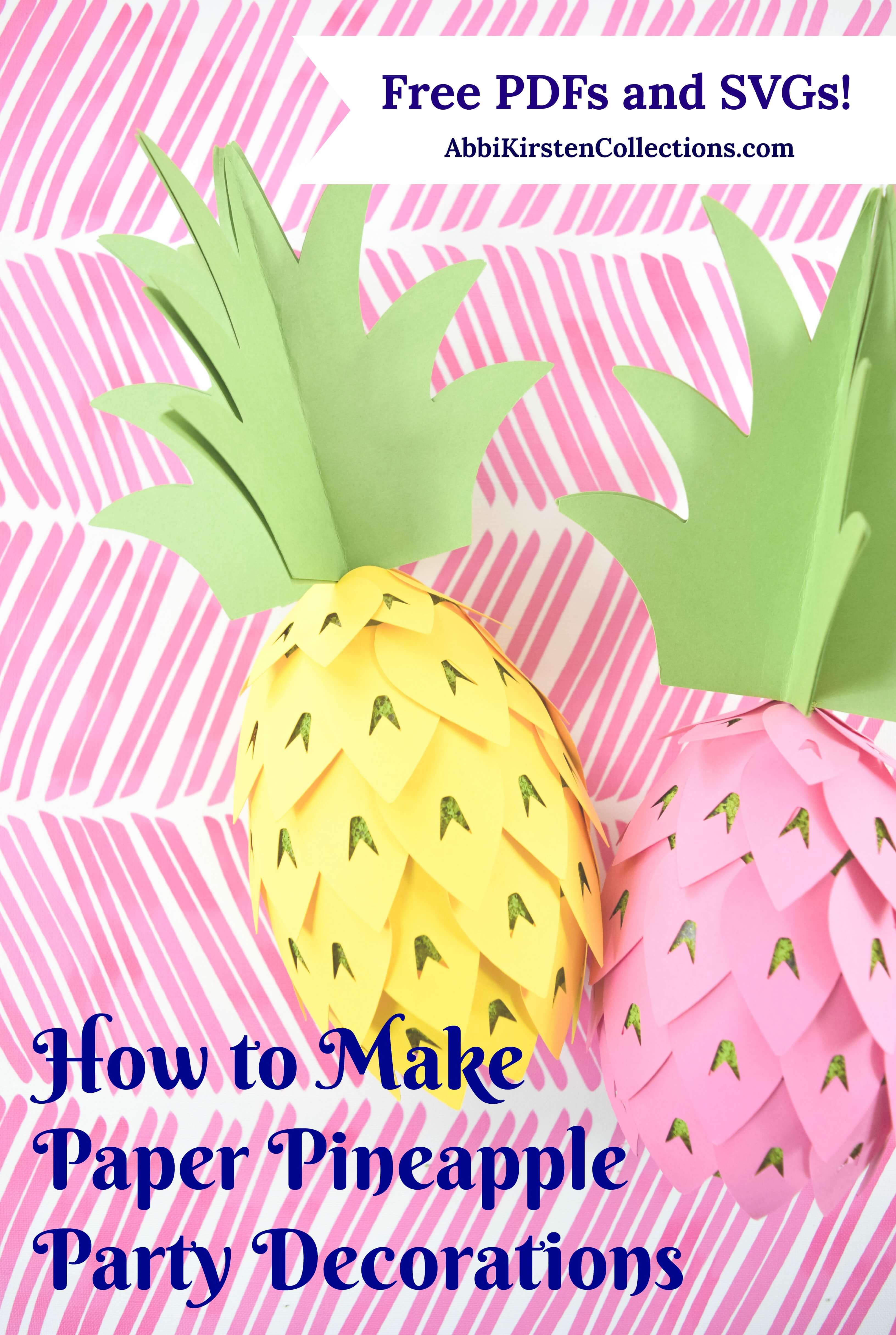 Two paper pineapples, one pink and one yellow, sit on a pink paper backdrop. The text reads, "How to Make Paper Pineapple Party Decorations" and "Free PDFs and SVGs abbikirstencollections.com."