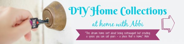 A banner ad shows a woman putting a key that says "home" into a door lock. The banner says "DIY Home Collections at home with Abbi." Beneath that is a quote from Abbi that reads "The dream home isn't about being extravagant but creating a space you can call your own." 