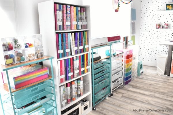 A wider view of my craft room organization project shows a wall of rolling carts, with supplies organized by type.