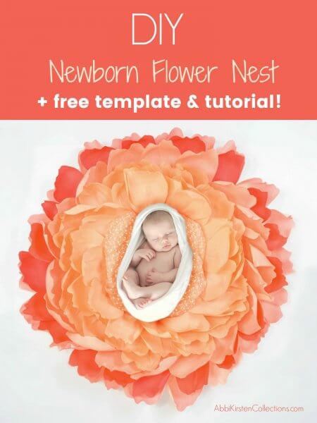 A picture of a sleeping newborn nestled in a giant crepe paper flower nest in shades of orange and pink. Above the photo is an orange rectangle text box with the words "DIY Newborn Flower Nest + free template and tutorial" in white. 
