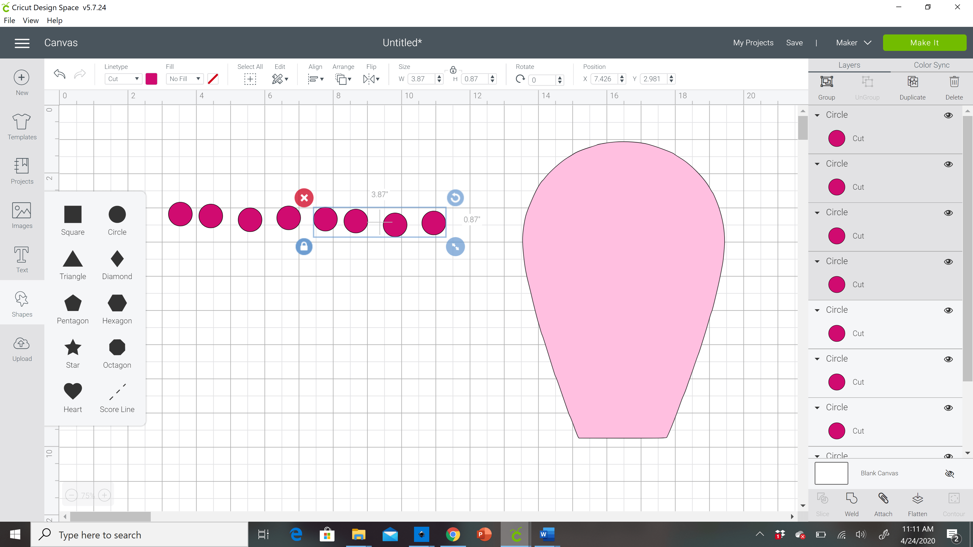 A screenshot of the Cricut Design Space canvas with multiple pink polka dots and a single light pink flower petal design. This demonstrates how to duplicate a pattern.
