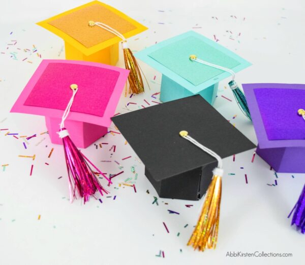 DIY Graduation cap gift box craft with free templates and step by step tutorial. Use your Cricut or printer to make these gift boxes for graduates.