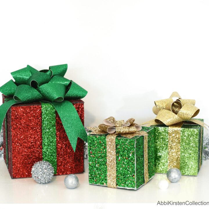 DIY decorative gift boxes made with red, green and golf faux glitter leather.