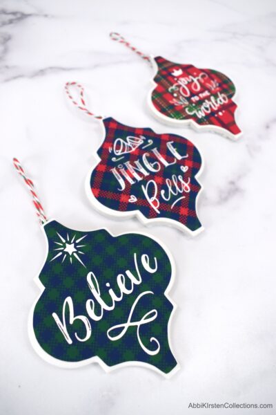 How to Make Tile Arabesque Christmas Ornaments with Cricut - Use our free tile templates for iron-on vinyl and print then cut tile christmas ornaments. 