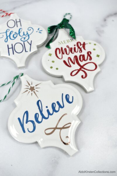 How to Make Tile Arabesque Christmas Ornaments with Cricut - Use our free tile templates for iron-on vinyl and print then cut tile christmas ornaments. 
