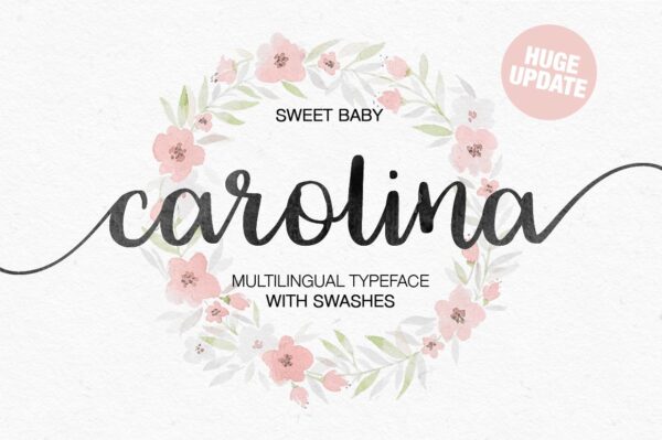 A washed out folk wreath with pink flowers acts as the background for the 'Sweet Baby Carolina' font in black. It's a multilingual typeface with swashes. 