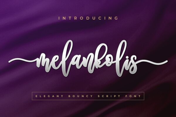A rectangle photo of deep purple cloth. The words "Introducing melankolis elegant bouncy script font" is centered on top. Find free Cricut fonts in this list. 
