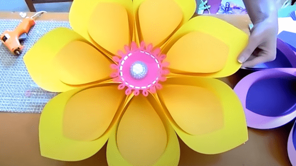 Giant paper flower tutorial for party backdrop decor. 