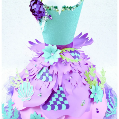 A green and purple Mermaid themed paper dress.